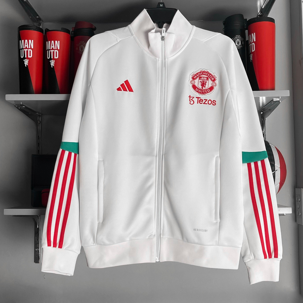 Áo khoác training MU- trắng khuỷ tay xanh lá