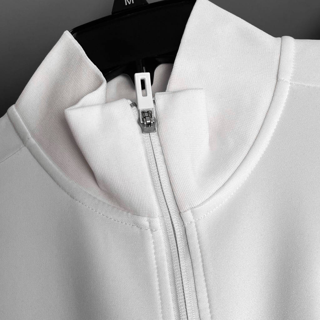 Áo khoác training MU- trắng khuỷ tay xanh lá