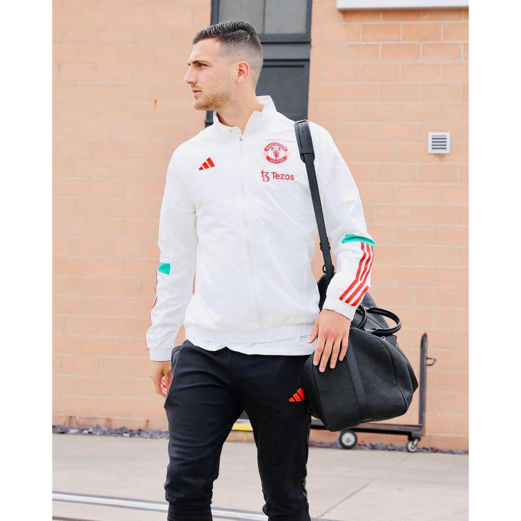 Áo khoác training MU- trắng khuỷ tay xanh lá