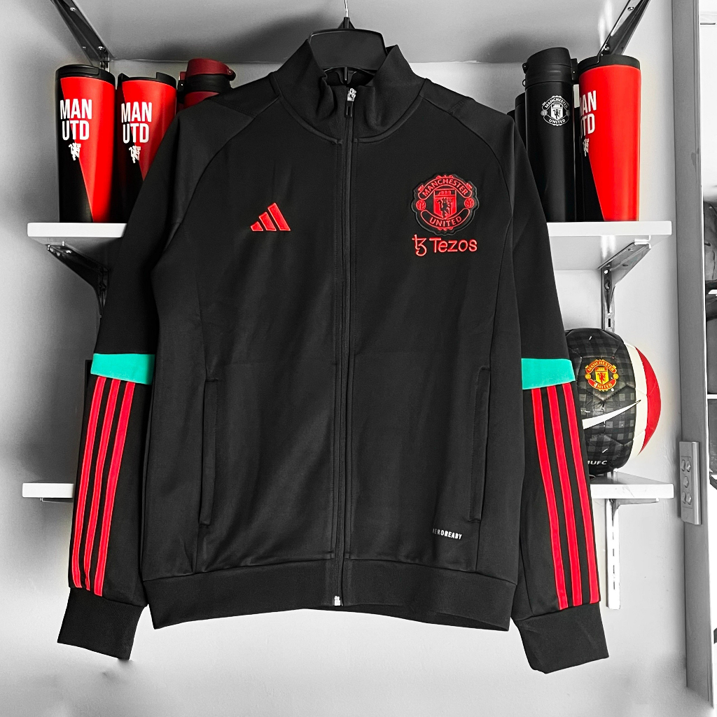 Áo khoác training MU- đen khuỷ tay xanh lá