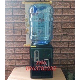 1 vỏ bình cổ cao 5galon dùng cho cây nóng lạnh có vòi nước màu xanh