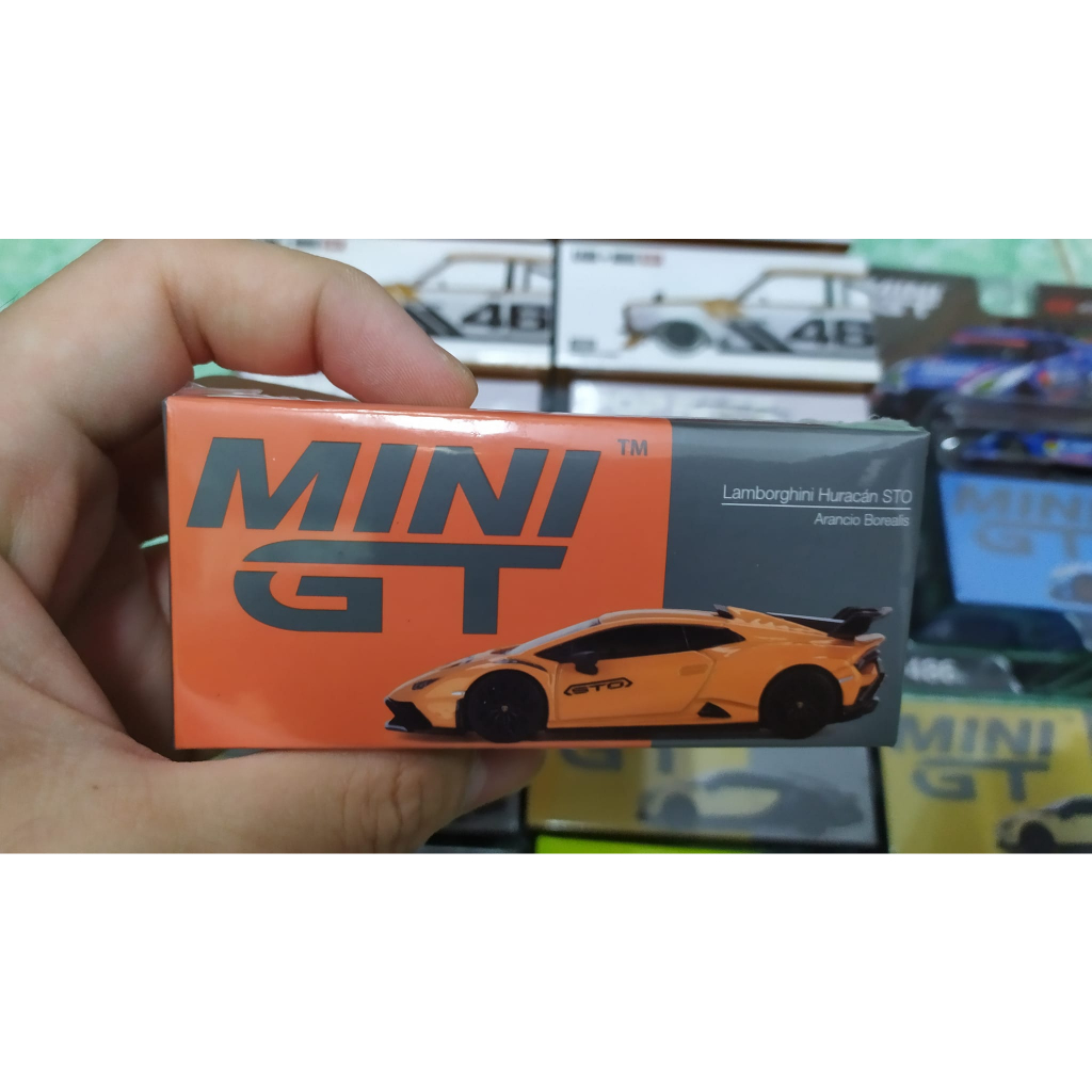 Mô hình ô tô Lamborghini Huracán STO Arancio Borealis 1/64 MiniGT MGT00511