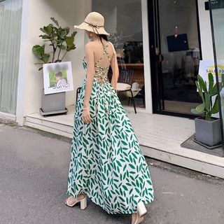 Đầm maxi hở lưng xẻ tà đan dây sau chiếc lá