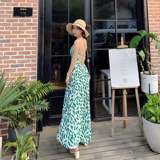 Đầm maxi hở lưng xẻ tà đan dây sau chiếc lá
