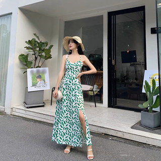 Đầm maxi hở lưng xẻ tà đan dây sau chiếc lá