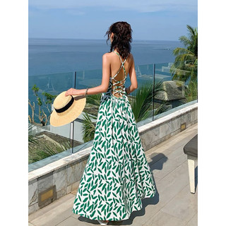 Đầm maxi hở lưng xẻ tà đan dây sau chiếc lá