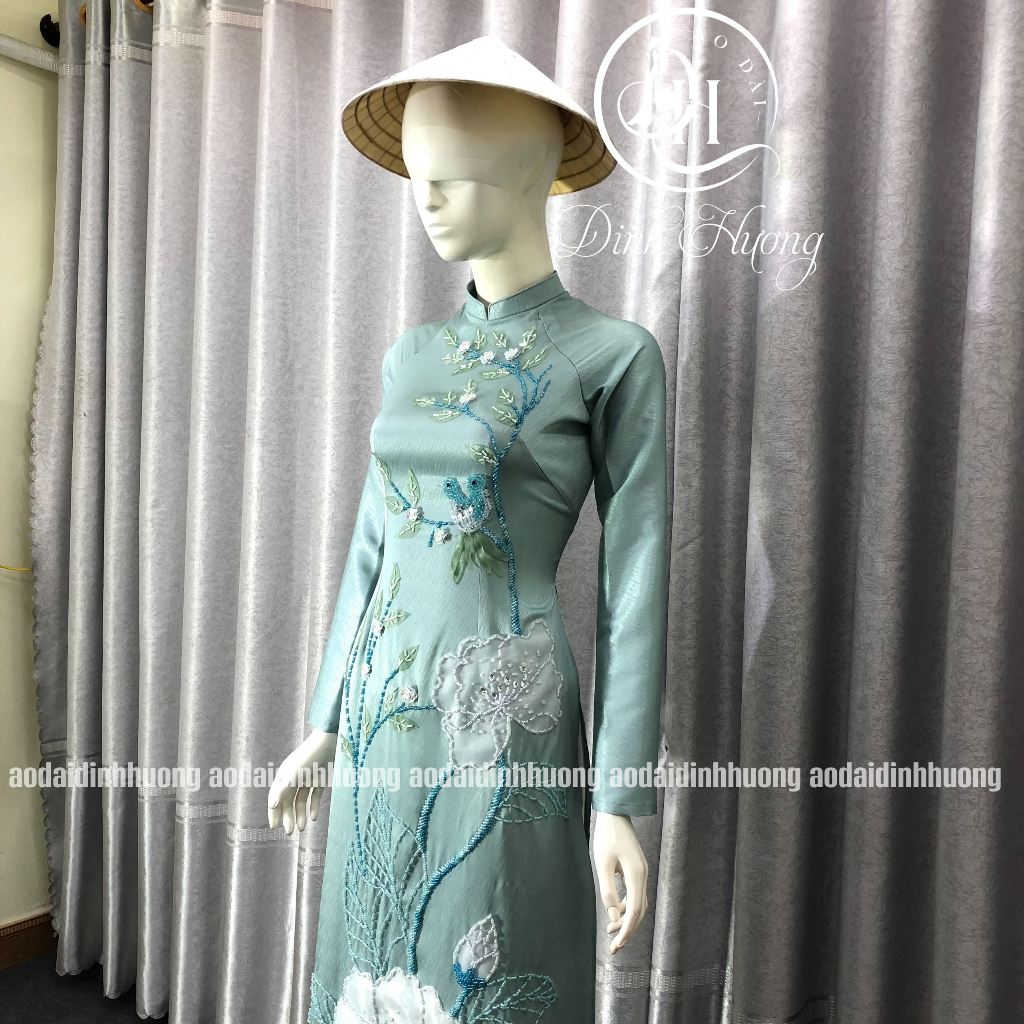 Áo dài thời trang Đinh Hương lụa vân gỗ xanh ngọc đính kết hoa trắng