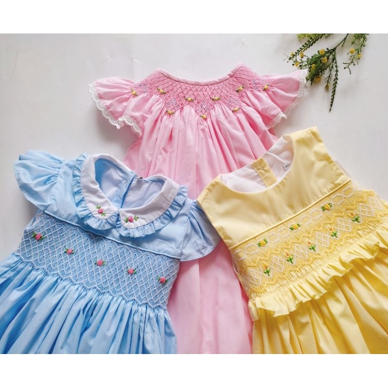 Đầm Smock vàng sát nách cho bé gái 13kg - 32kg