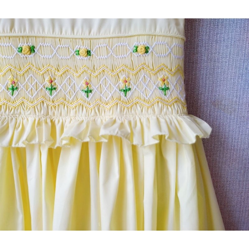 Đầm Smock vàng sát nách cho bé gái 13kg - 32kg