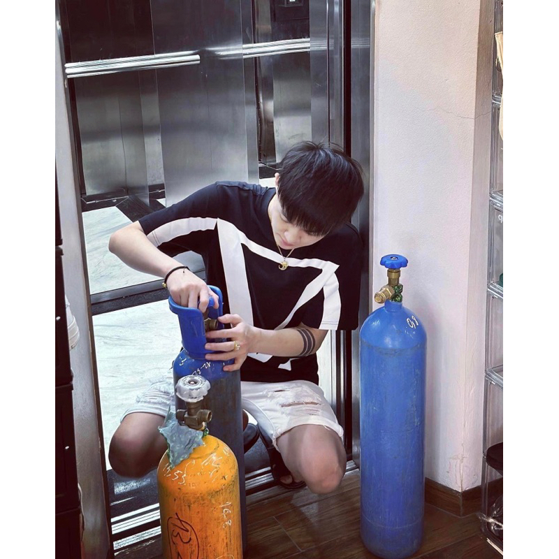 Áo Phông Nam Hoạ tiết MonoGram Va len tilo_ Áo Thun Nam Nữ L.V Hoạ Tiết VLTN đen trắng ngang thân Siêu Hot. GenZ.Store