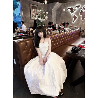 Đầm kem chun lưng vải gấm nơ