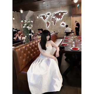 Đầm kem chun lưng vải gấm nơ