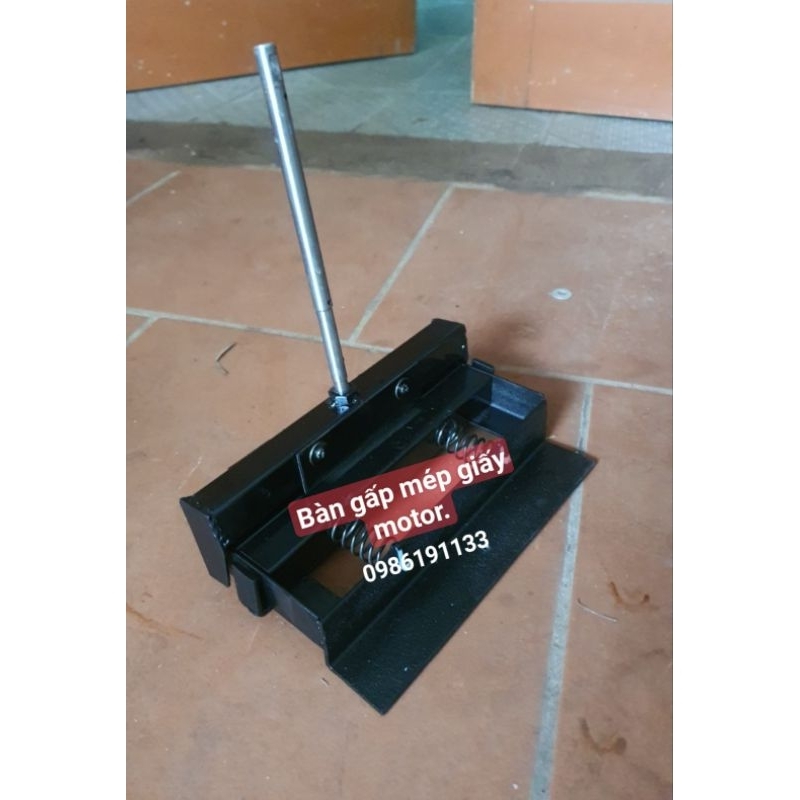 Bàn gấp mép giấy motor.