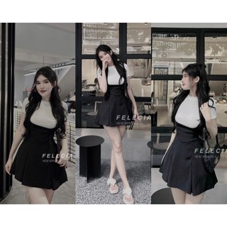 Set yếm đen + áo pull trắng cổ tròn