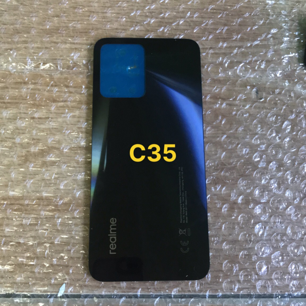 Nắp lưng sau Realme C35 có kính camera