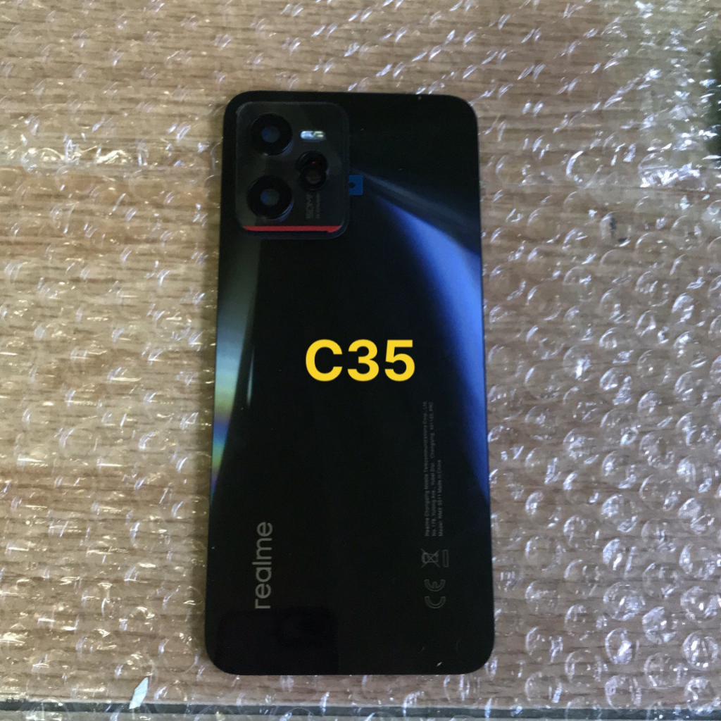 Nắp lưng sau Realme C35 có kính camera