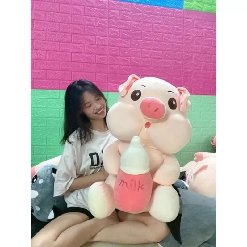 Gấu Bông heo bú bình