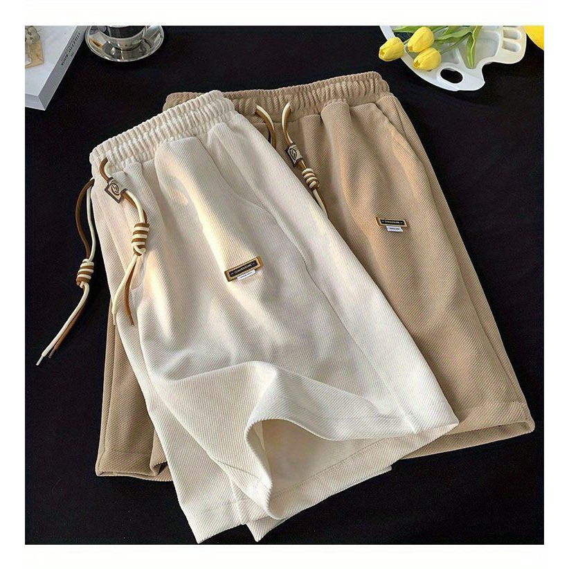 Quần Short nam nữ mác cao su, chất vải mới mềm mát, thiết kế đơn giản dây rút bản đôi xu hướng 2023