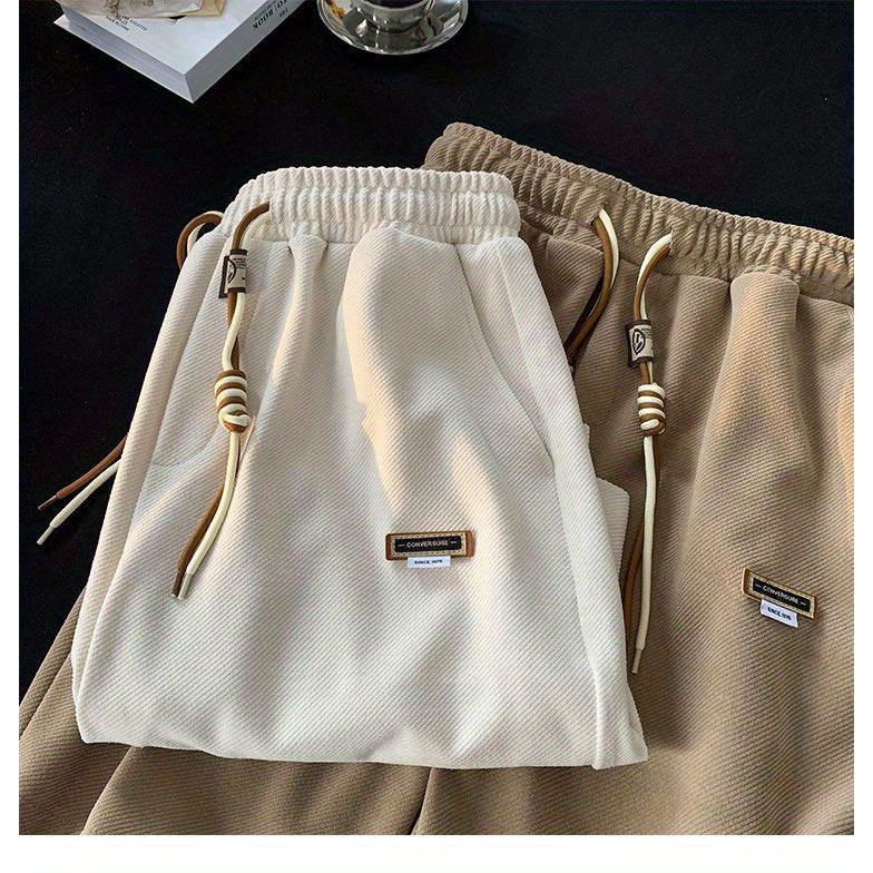Quần Short nam nữ mác cao su, chất vải mới mềm mát, thiết kế đơn giản dây rút bản đôi xu hướng 2023