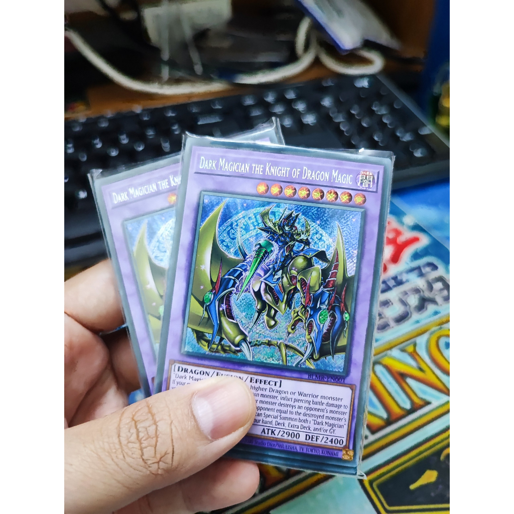 1 lá thẻ bài Dark Magician the Knight of Dragon Magic - BLMR-EN001 - Secret Rare 1st Edition
