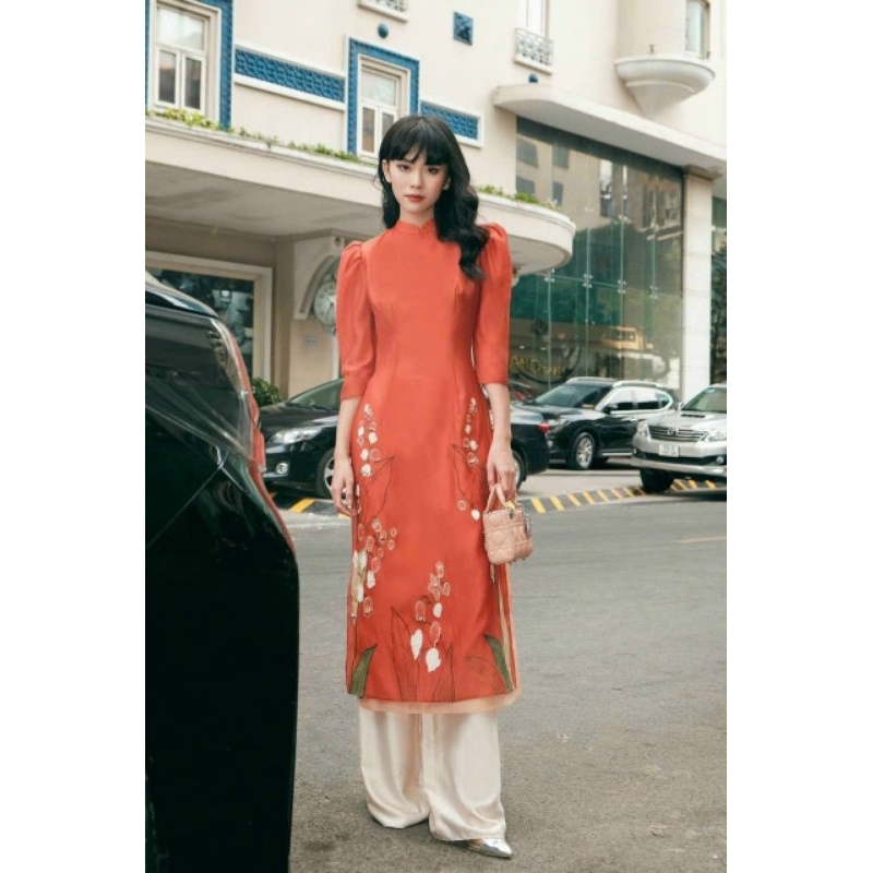 Áo dài cách tân màu cam tay bồng Lạc Yên