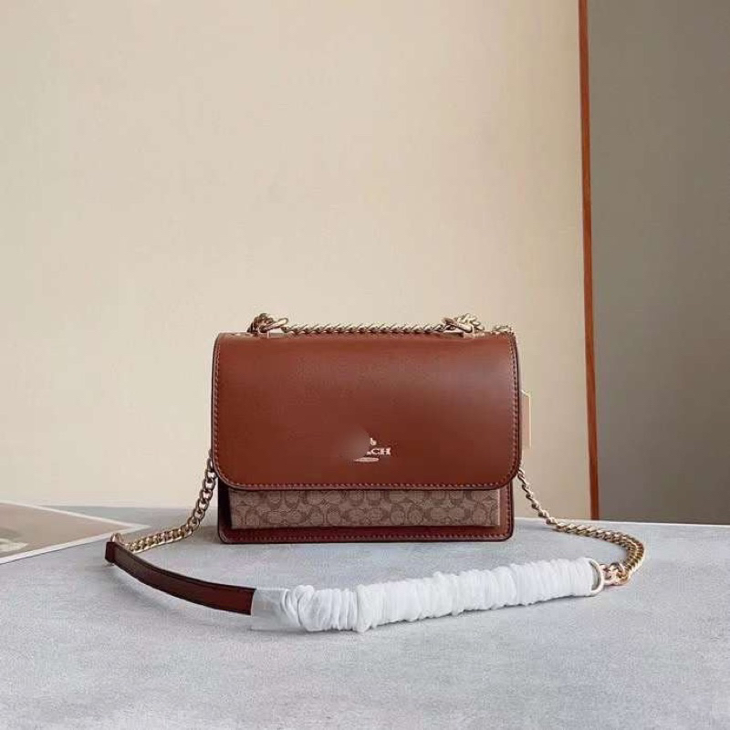 Túi Coach Klare nắp gập