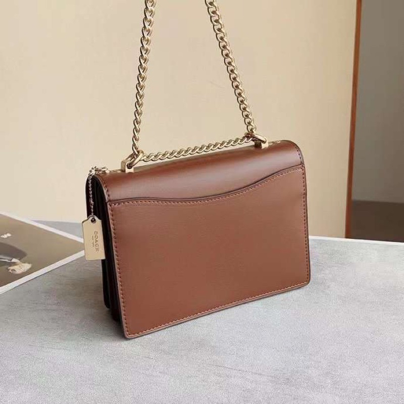 Túi Coach Klare nắp gập