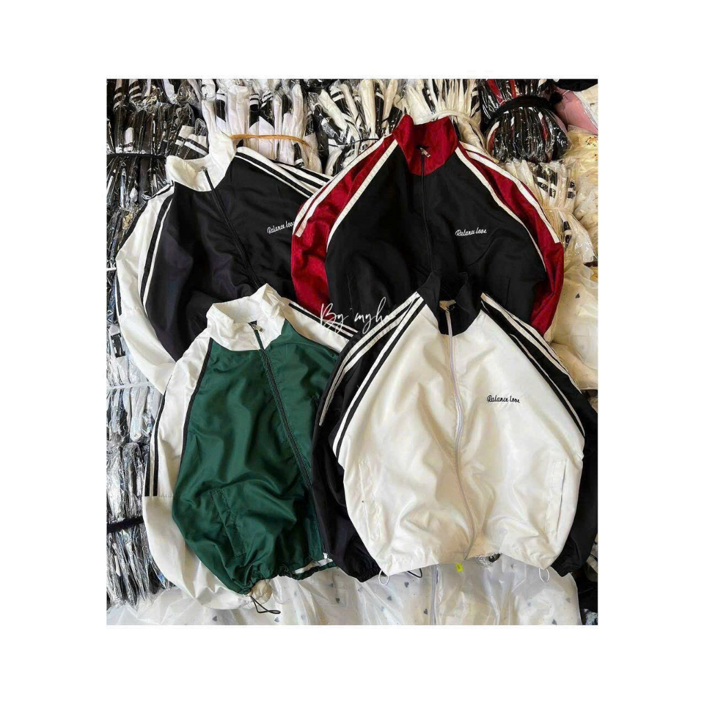 Áo khoác dù nữ tay phối sọc, lai rút dây