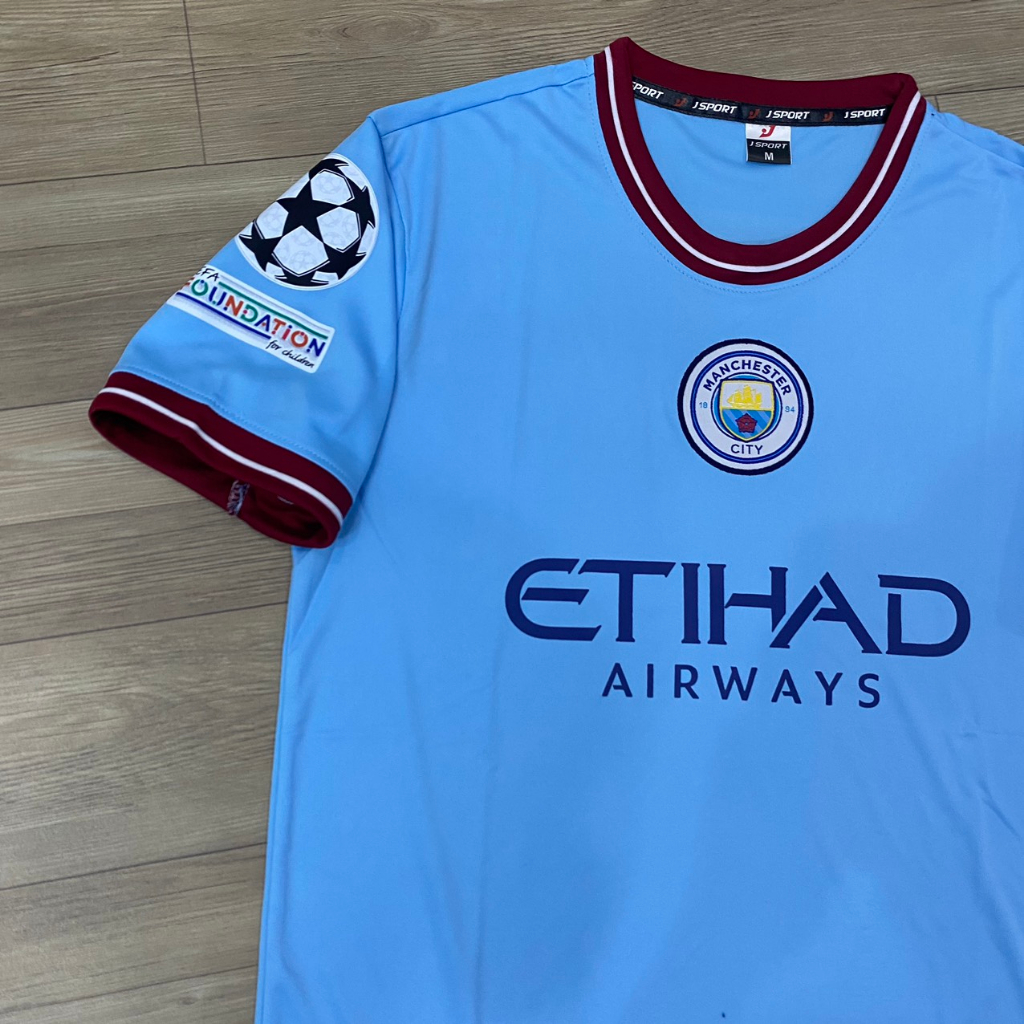 Bộ quần áo bóng đá Man City MC sân nhà JP2023 Logo Cup C1