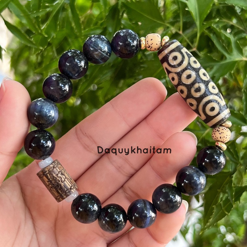 Vòng tay hổ phách mix Dzi 21 mắt lu thống trầm sánh