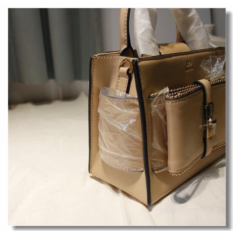 TÚI LYN NƠ CẦM TAY