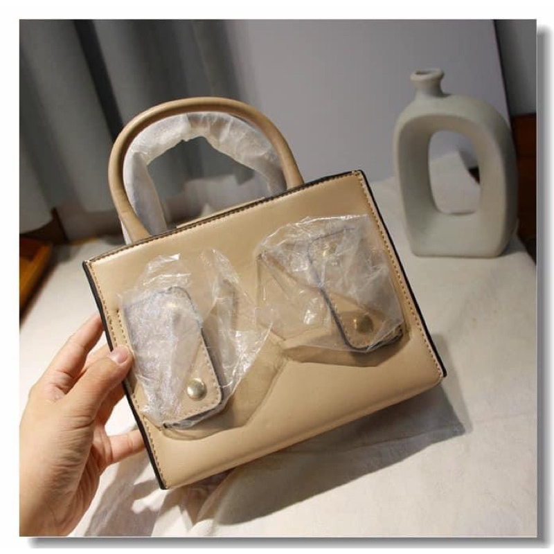 TÚI LYN NƠ CẦM TAY