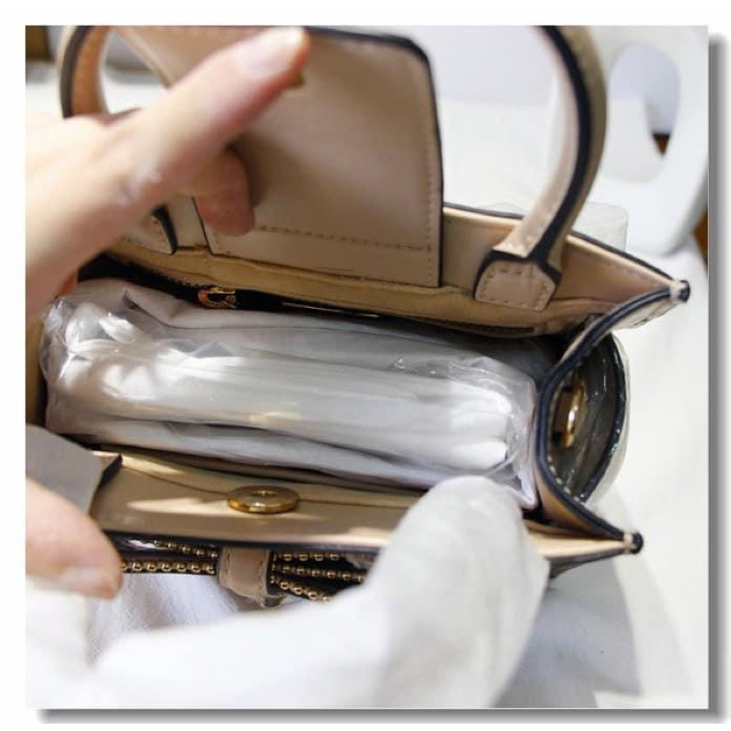 TÚI LYN NƠ CẦM TAY