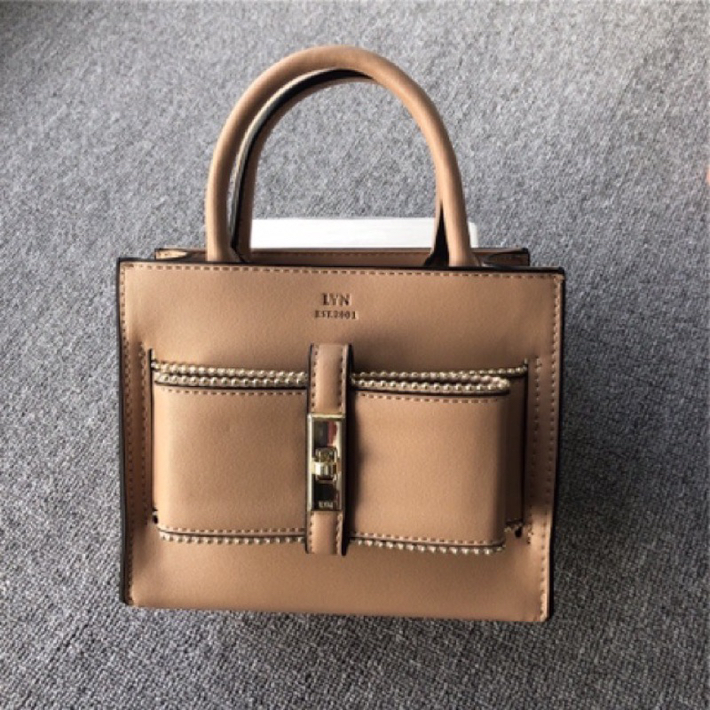 TÚI LYN NƠ CẦM TAY