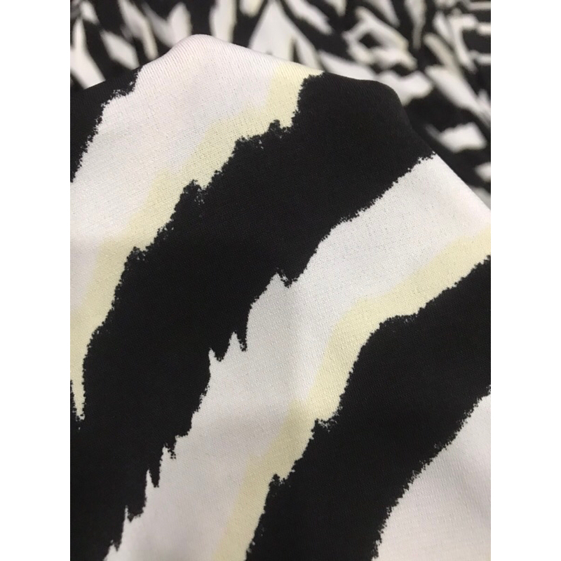 Vải thun Rayon họa tiết như hình co giãn 4 chiều dày vừa mềm rũ may đầm váy,áo kiểu , đồ bộ