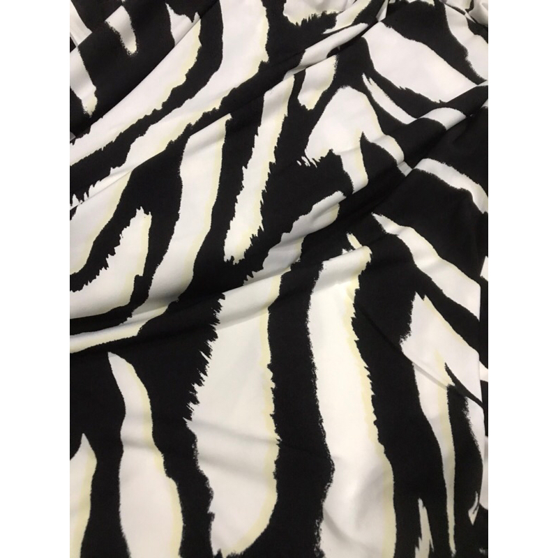 Vải thun Rayon họa tiết như hình co giãn 4 chiều dày vừa mềm rũ may đầm váy,áo kiểu , đồ bộ