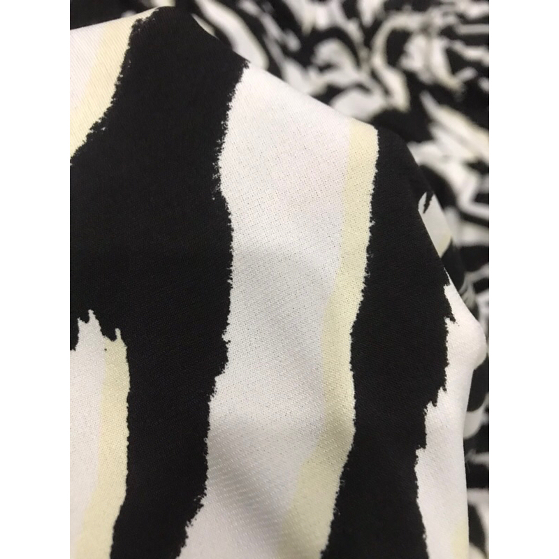 Vải thun Rayon họa tiết như hình co giãn 4 chiều dày vừa mềm rũ may đầm váy,áo kiểu , đồ bộ