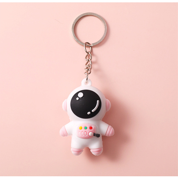 Móc khóa phi hành gia màu xanh và hồng