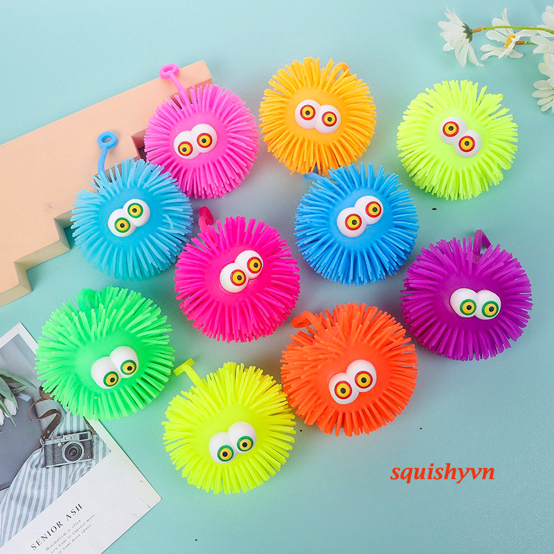 Squishy Mochi hình QUẢ CHÔM CHÔM phát sáng con sida tua rua phát sáng có dây chơi