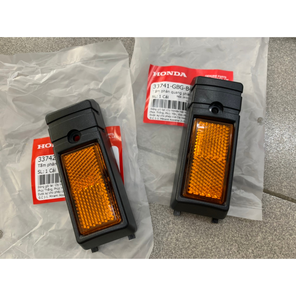 Phản quang ốp phuộc trước Dream Spe zin Honda ( cặp 2 bên )