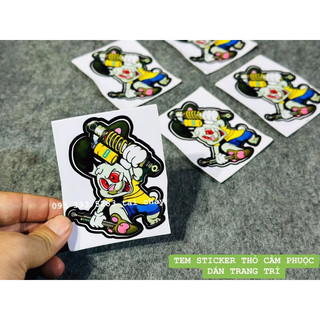 Tem sticker thỏ cầm phuộc ohnlins dán trang trí xe