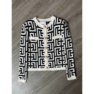 Áo len hoạ tiết QC LV