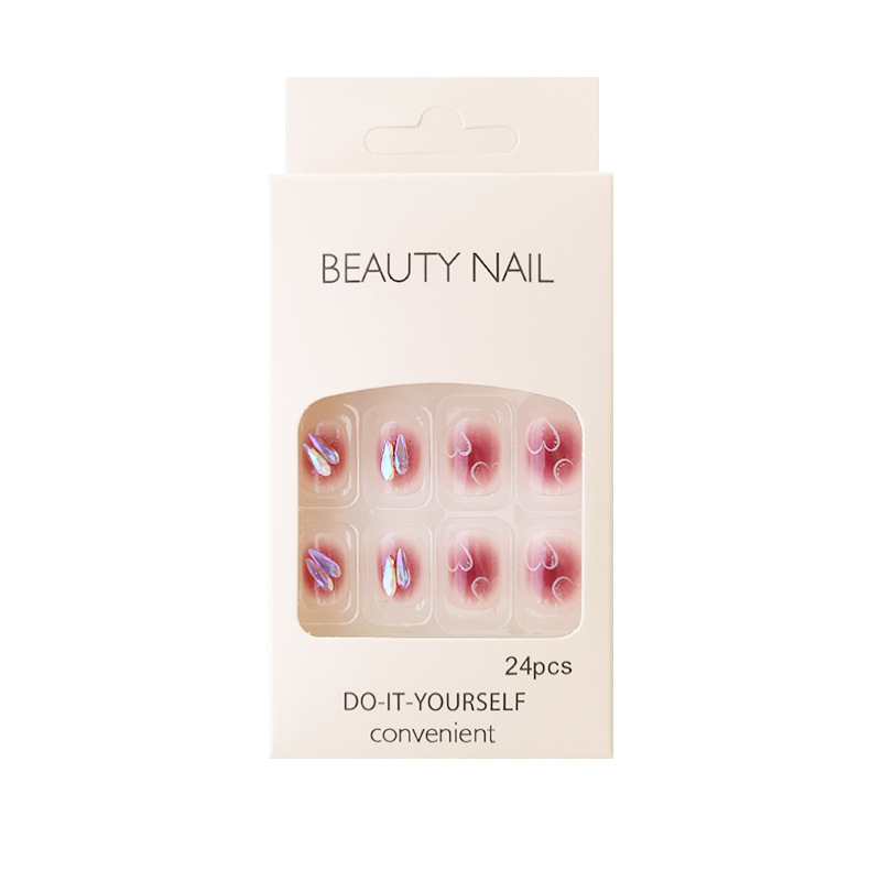 Móng tay giả Chinaa Nii form ngắn màu hồng họa tiết trái tim.