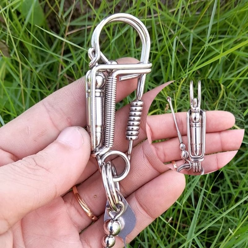 móc khóa inox gắn hình viên đạn đọc lạ