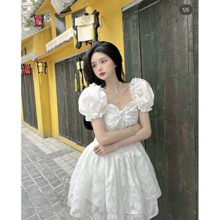 ĐẦM TRẮNG XÒE HOA NỔI TẦNG ĐÍNH NƠ NHÍU NGỰC TAY BO PHỒNG phong cách tiểu thư sang chảnh Tanii Clothing