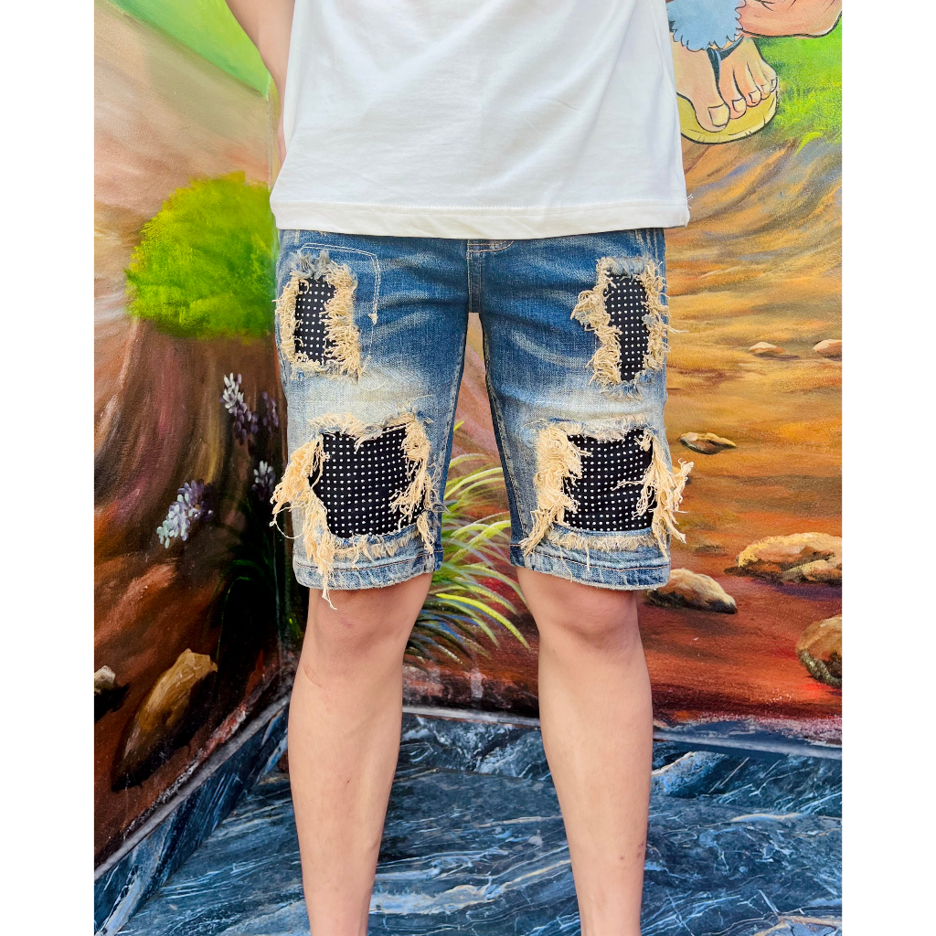 Quần Ngố Amiri wash xanh vàng rách tua viền vá vải đính đá bạc phong cách boy phố