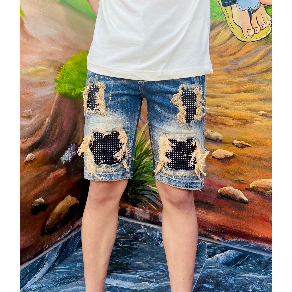 Quần Ngố Amiri wash xanh vàng rách tua viền vá vải đính đá bạc phong cách boy phố