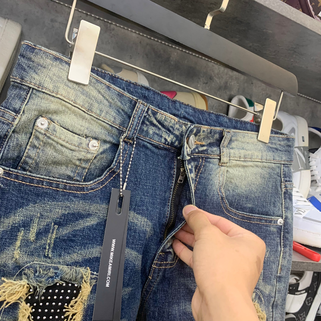 Quần Ngố Amiri wash xanh vàng rách tua viền vá vải đính đá bạc phong cách boy phố