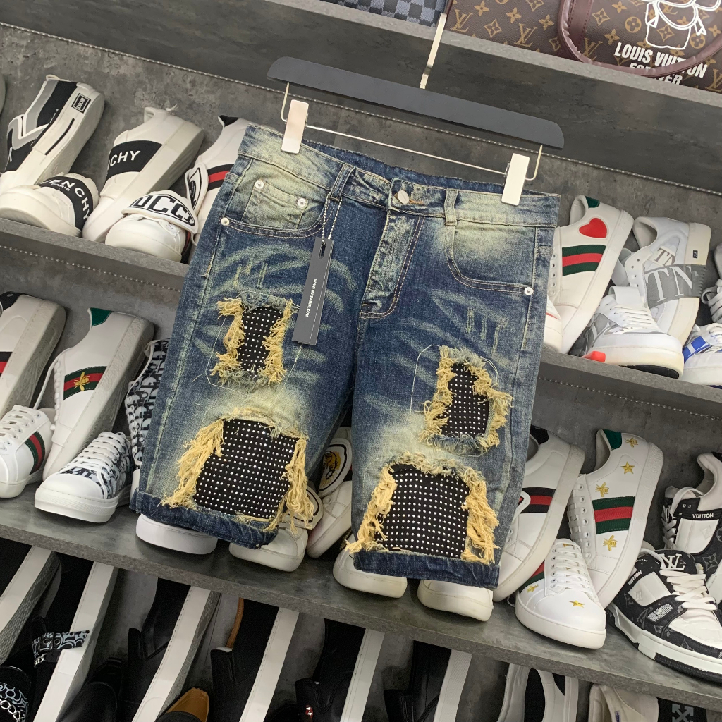 Quần Ngố Amiri wash xanh vàng rách tua viền vá vải đính đá bạc phong cách boy phố