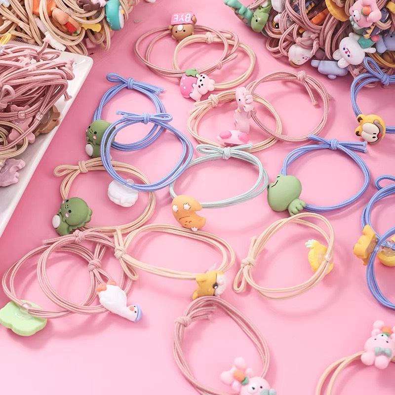 Dây cột tóc gắn charm hoạt hình dễ thương